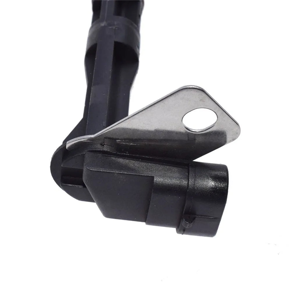 Black General Motors car sensor replacement part on a white background.