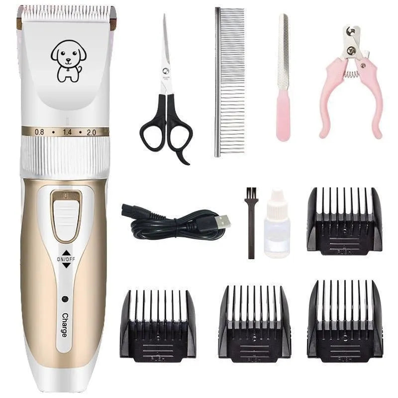 White handled dog grooming clipper kit with ceramic blades, four combs, oil, brush and USB cable on table.