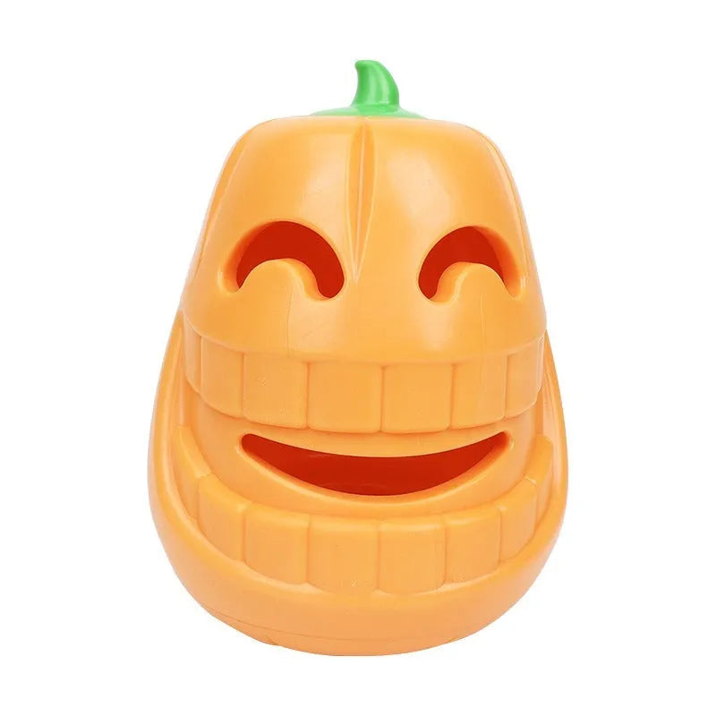 Orange Halloween pumpkin-shaped dog chew toy with a treat-dispensing funnel hole.