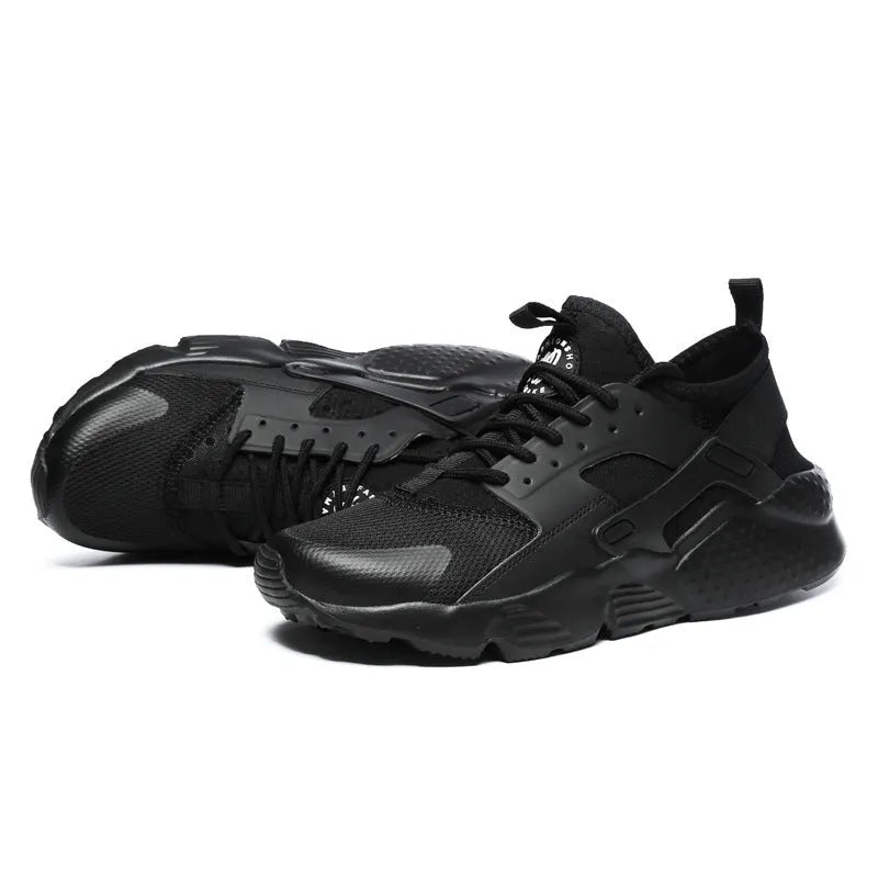 Women's lightweight mesh sports shoes with flat heel and round toe in black and white colour