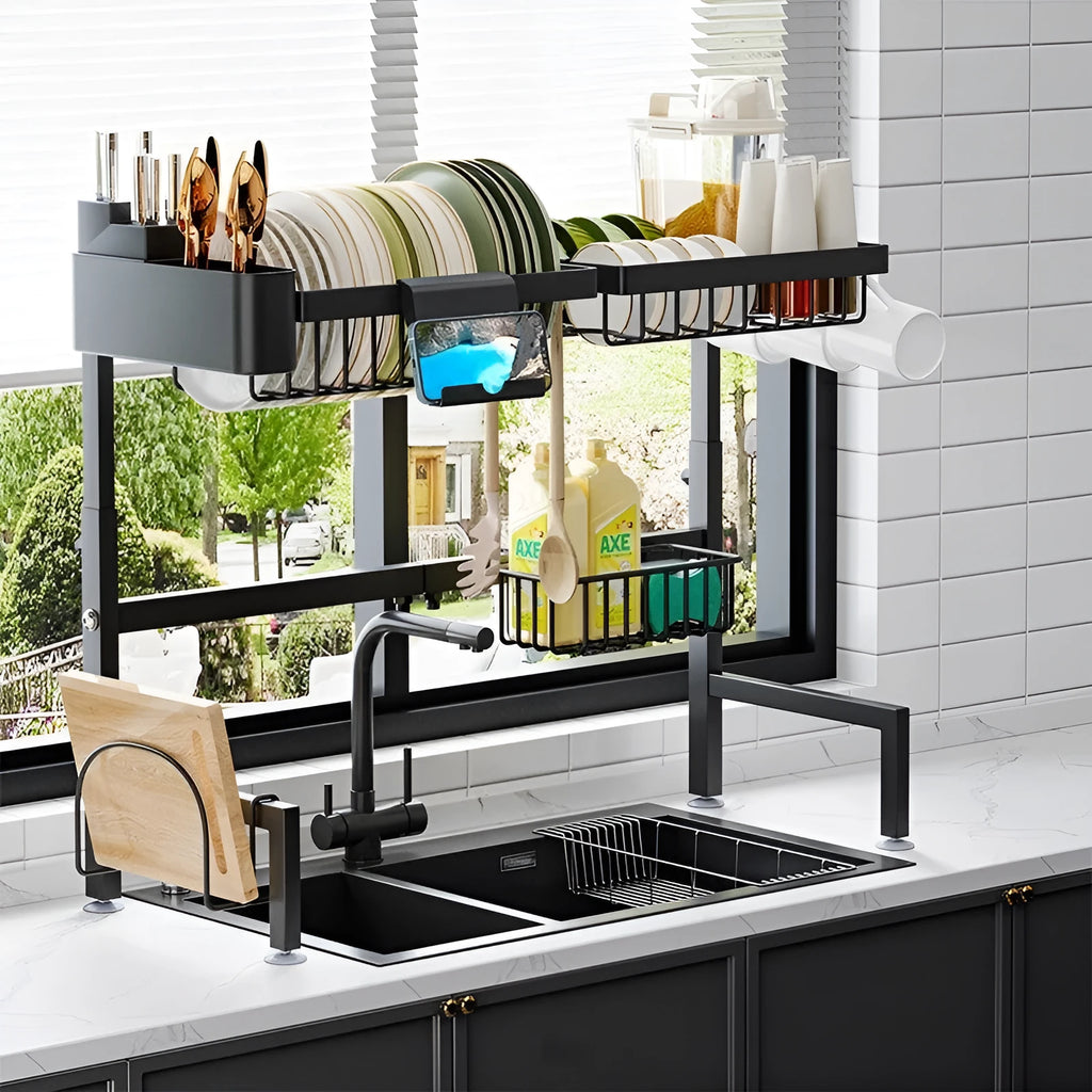 Black retractable metal kitchen draining rack with water pot holder on countertop