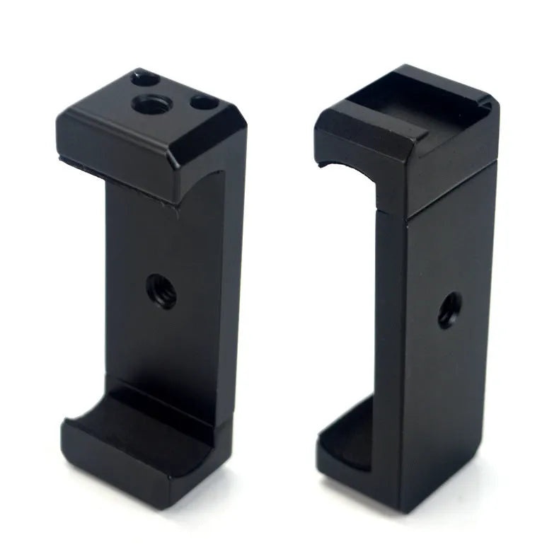 Aluminium alloy handheld bracket accessory for mounting an iPhone onto a table top tripod.