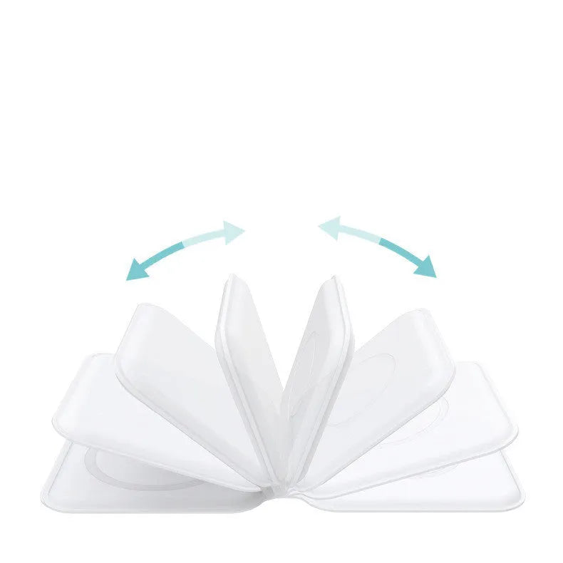 White folding magnetic wireless charger in stand mode, charging a smartphone at an angle