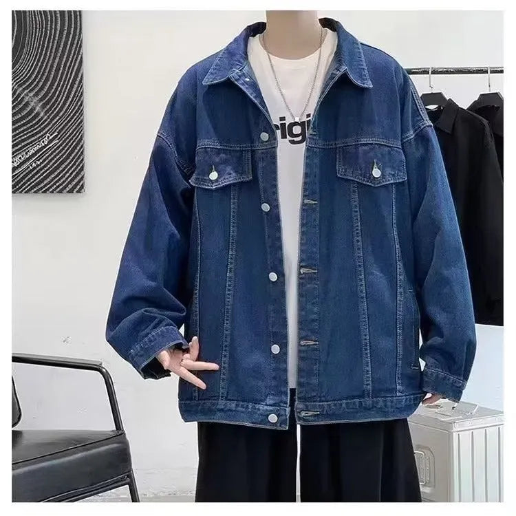 Loose-fitting denim jacket in dark blue, light blue, or black with long sleeves and straight hem, sizes M-3XL