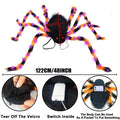 Orange purple light Halloween spider backpack with LED lights on plush fabric.