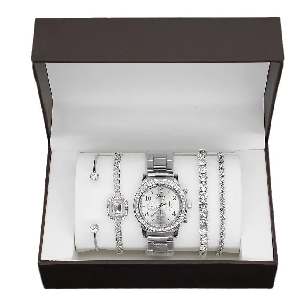 Women's 4 piece watch and bracelet set in gold colour with quartz movement and 34mm dial on display