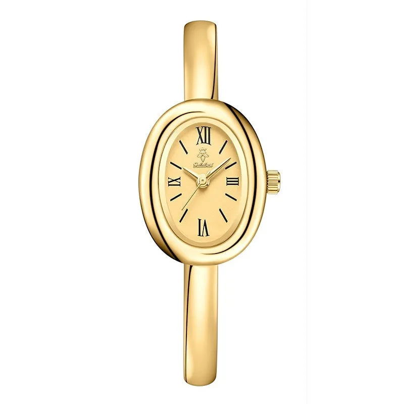 Women's gold and silver oval retro quartz watch with spiral patterns on a 8mm thick case.