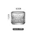 Modern simplicity clear glass whiskey cup with diamond pattern on a table, single piece