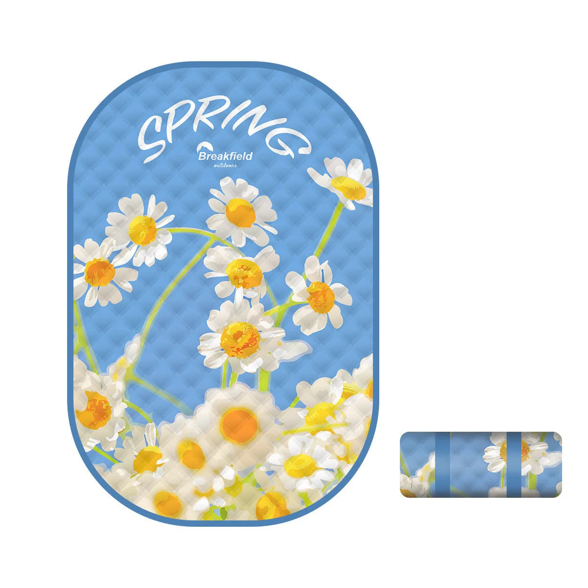 A large waterproof picnic mat in a seasonal colour, laid out on grass for a group.