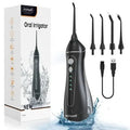Black portable oral irrigator with water reservoir and nozzle for adult dental cleaning