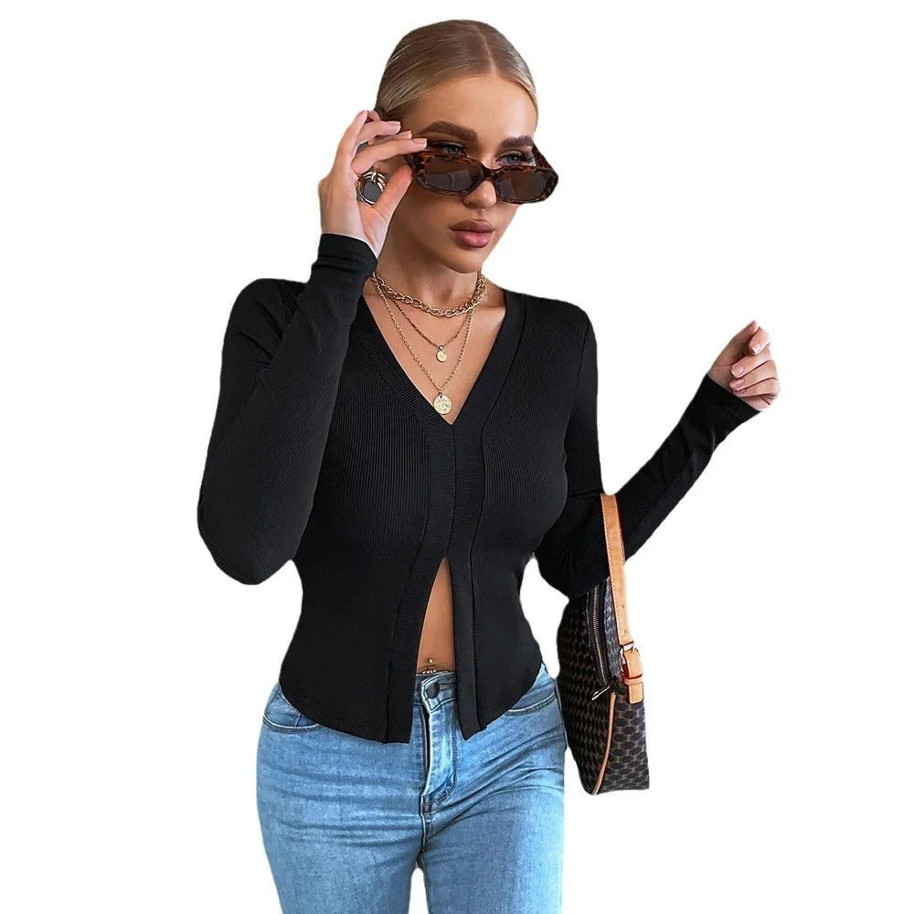 Black women's long sleeve slim fit cropped T-shirt with split neck and slit detail, sizes XS-XL