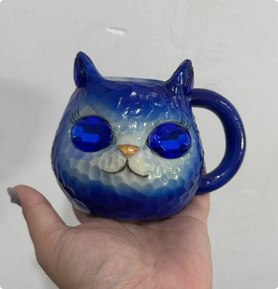 American-style cat cup resin craft ornament in purple, green, blue, and pink colours.