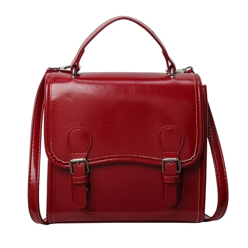 Simple PU backpack in urban college style, available in white, black, wine red, and silver, with polyester lining and sewing thread detail.