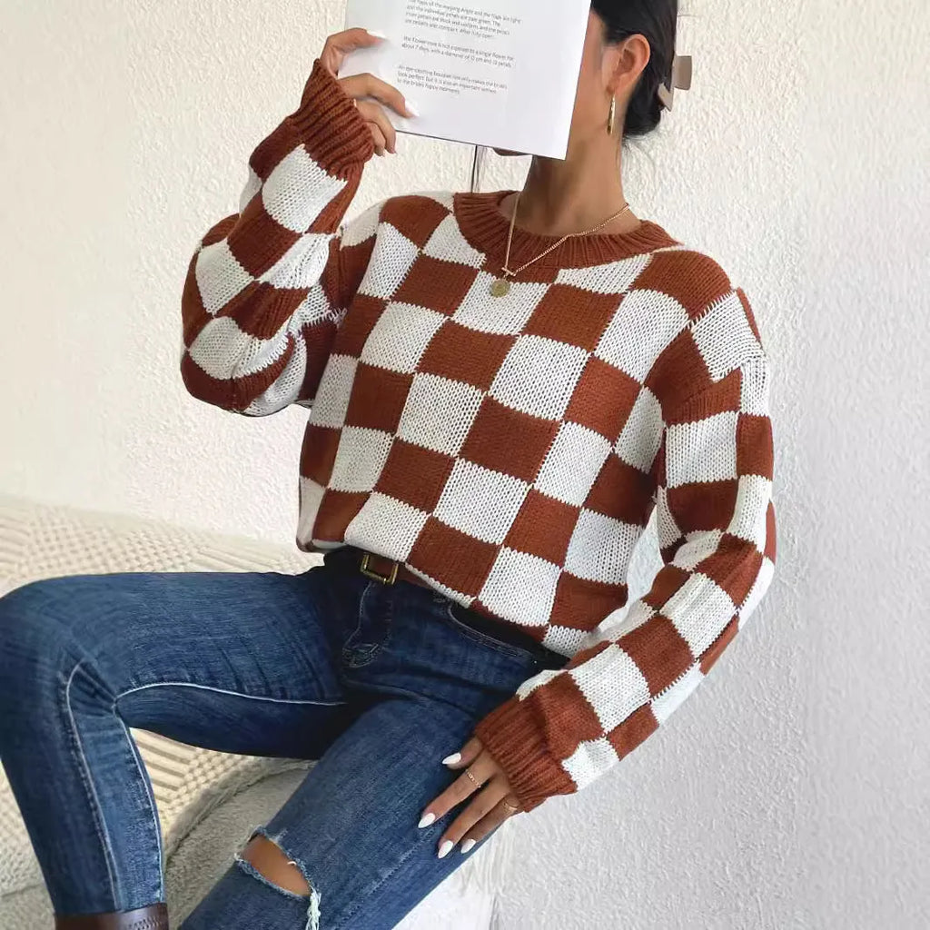 Dark brown plaid women's loose pullover sweater with round neck and long sleeves.