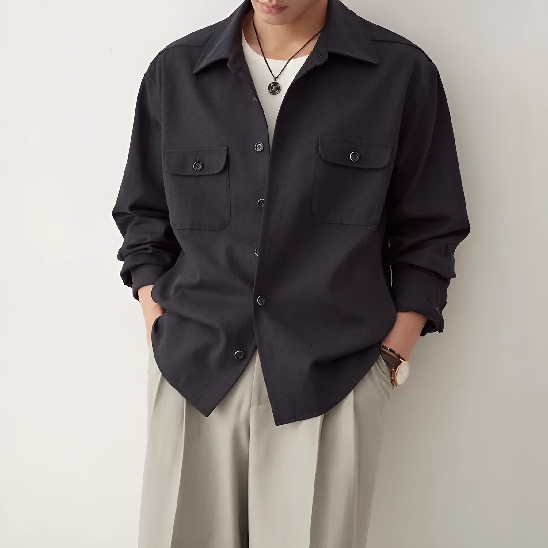 Men's light sand rice coloured shirt with a lapel collar and long sleeves.