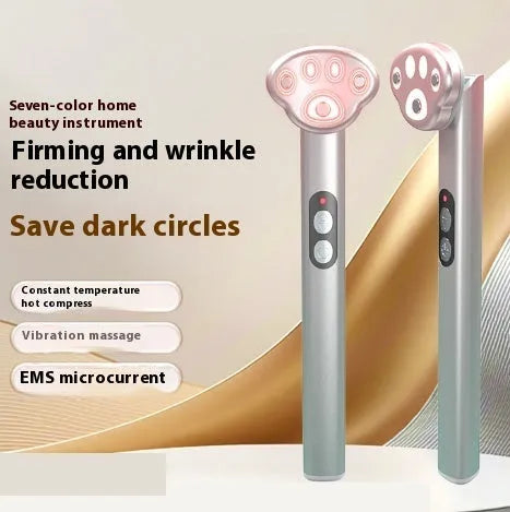 Gradient pink cat's paw shaped handheld micro-current eye and facial massager