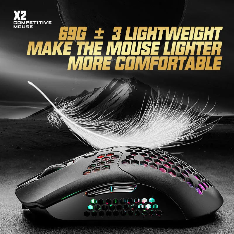 Free Wolf X2 wireless gaming mouse in black on a mouse mat, showing right-handed contour and RGB lighting.