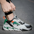 Men's PU leather sports casual shoes in green or orange with colour matching, sizes 39 to 44