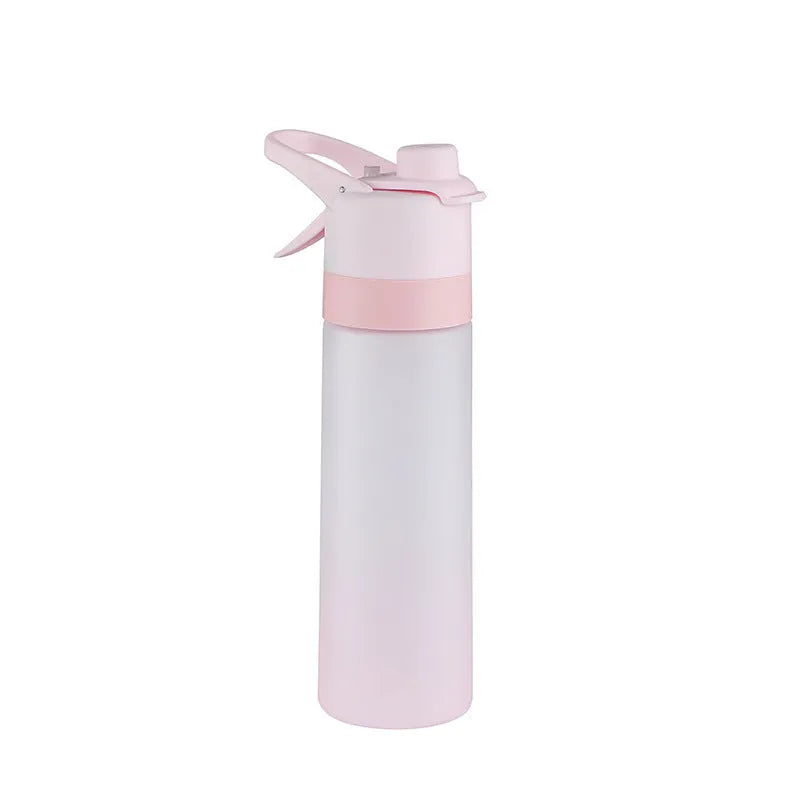White plastic spray water bottle with handle strap and leakproof lid on a gym bag.
