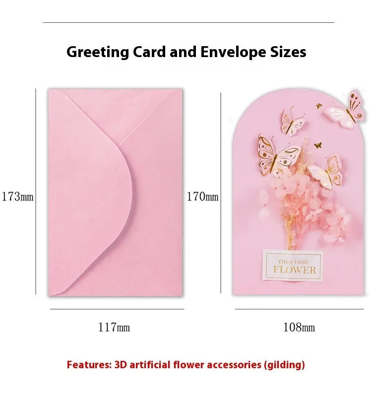 Handmade 3D boxed birthday card with butterfly shape and artificial flowers.