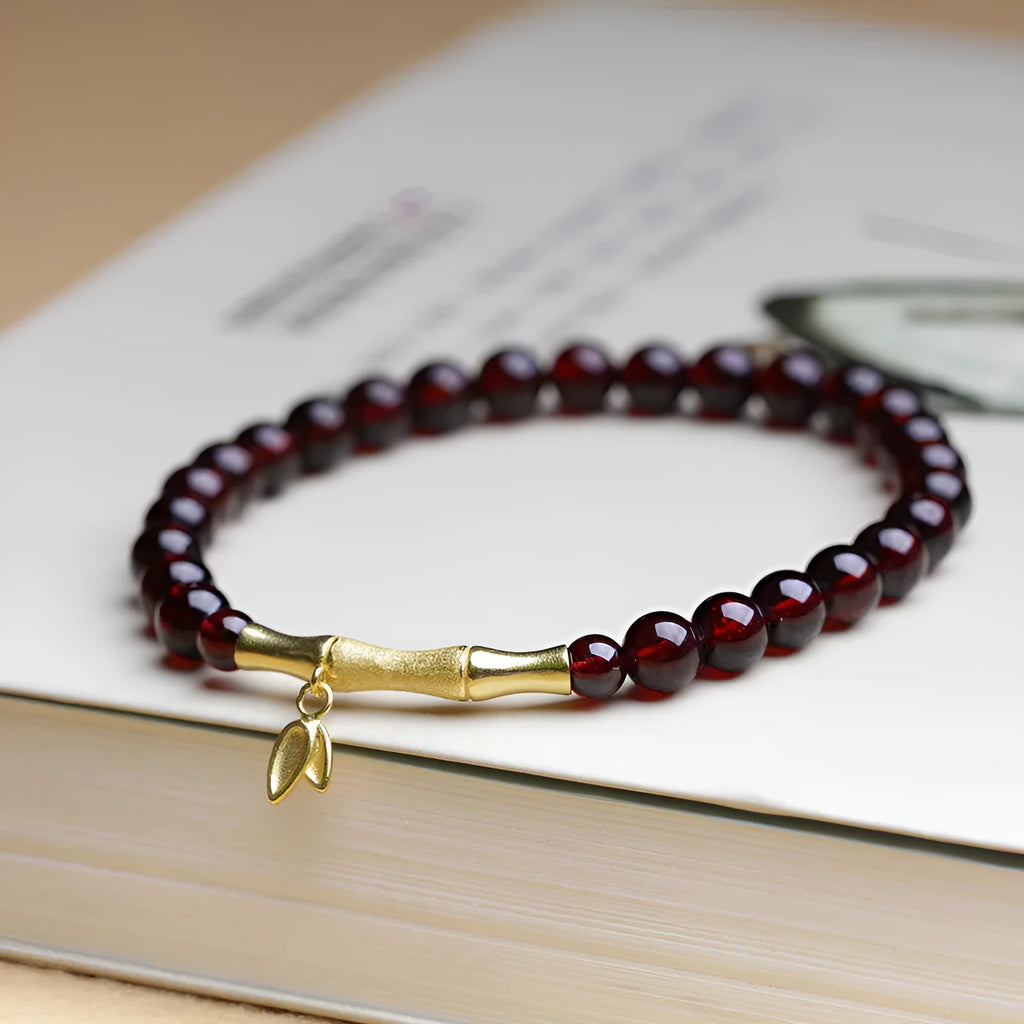 Handmade natural garnet bamboo joint bracelet in copper or silver finish, 6mm bead size.