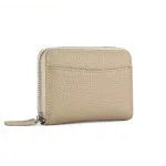 Genuine leather zipper coin purse in solid colour with anti-theft feature and sewing line detail.
