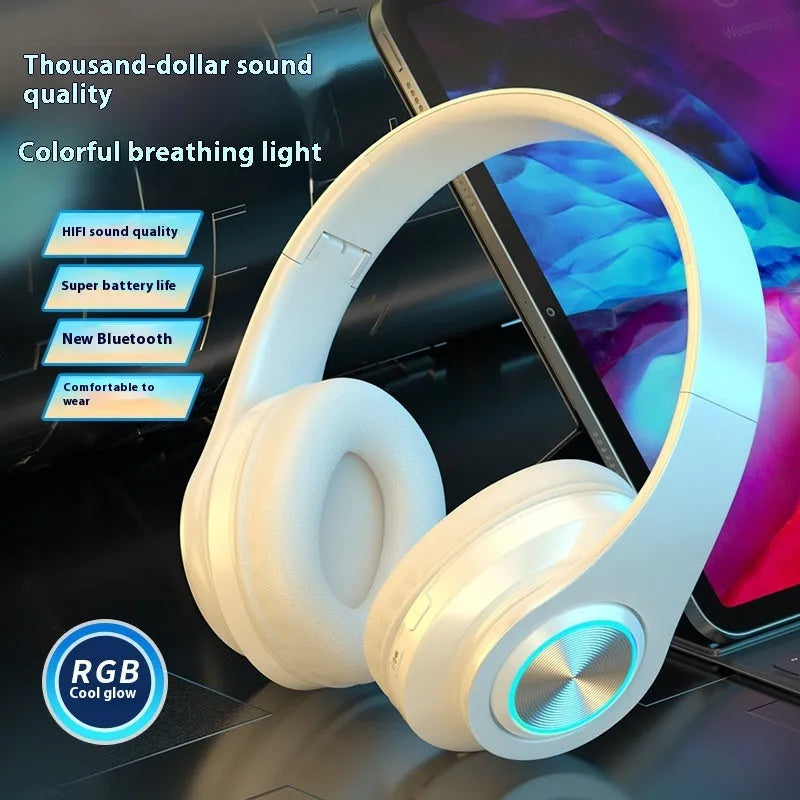 Black head-mounted Bluetooth gaming headset with over-ear cups and adjustable band.