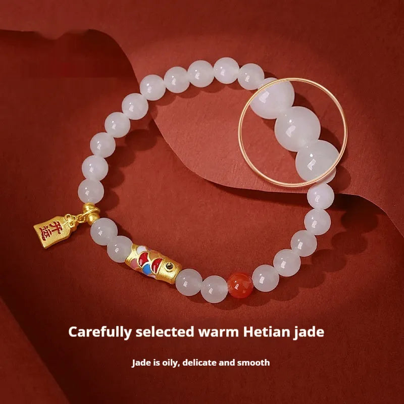 Hetian jade bracelet with koi fish design in S925 sterling silver setting