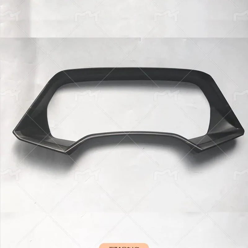 BMW X5 dashboard decorative frame in ABS plastic with Carbon Fibre and Peach Wood finish options