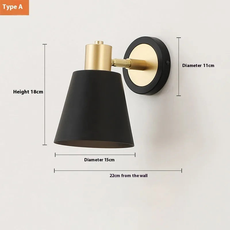 Nordic style iron wall lamp with adjustable LED light on a plain wall.