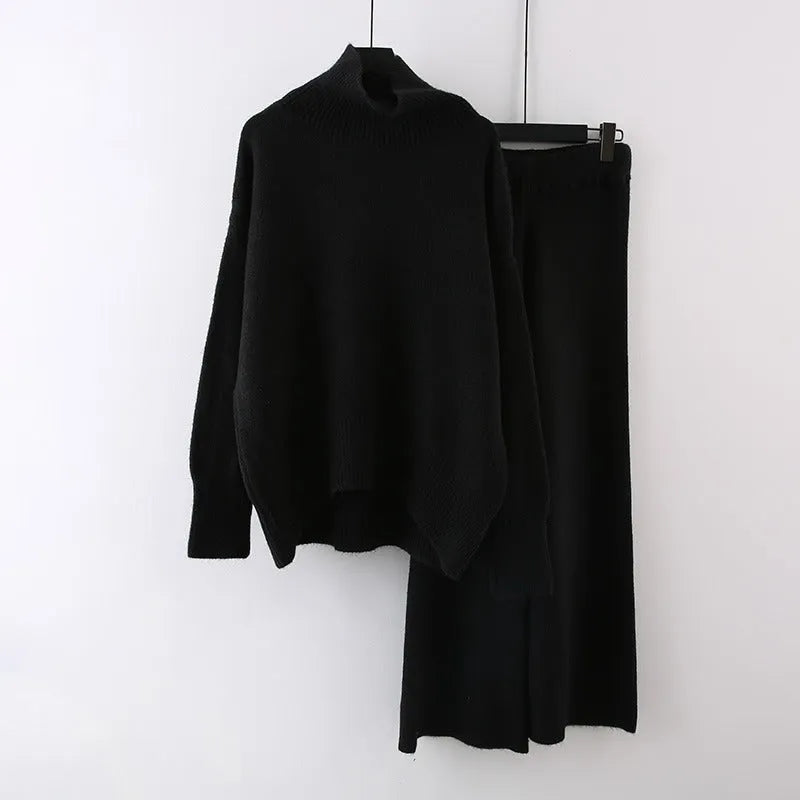 Women's beige acrylic sweater and wide-leg trousers two-piece set laid flat.