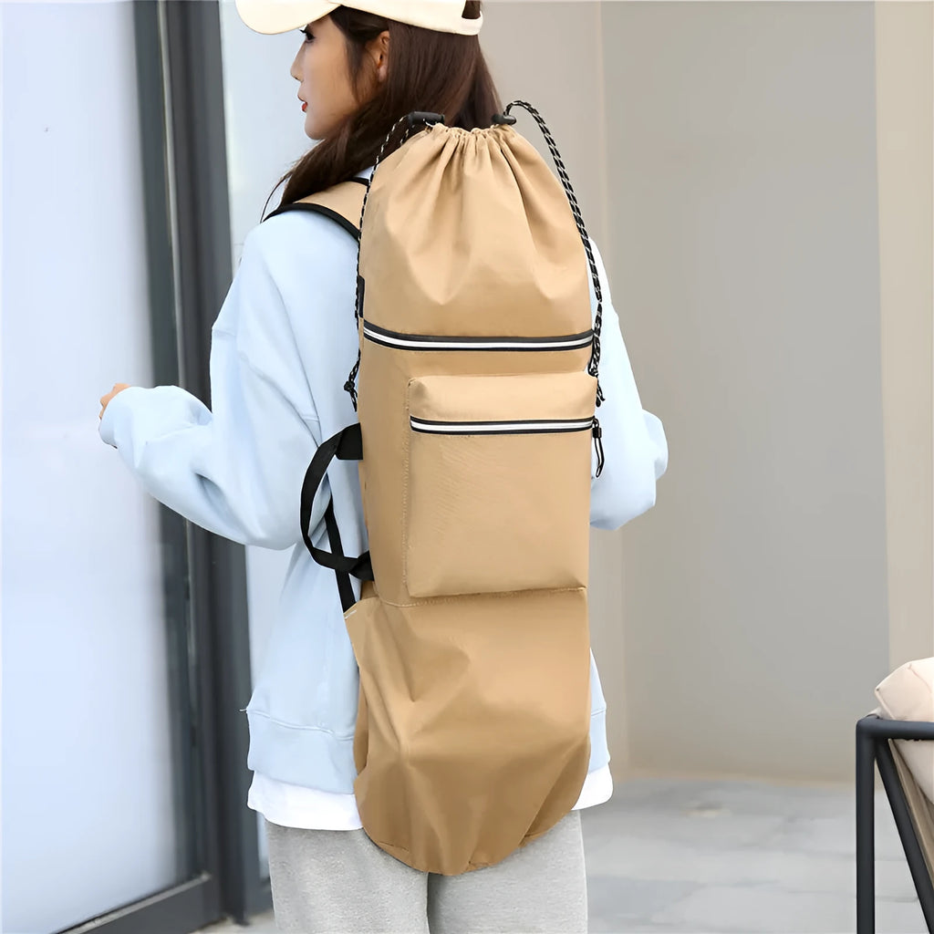 Black waterproof nylon skateboard backpack on a bench, showing its size and straps for carrying long equipment.