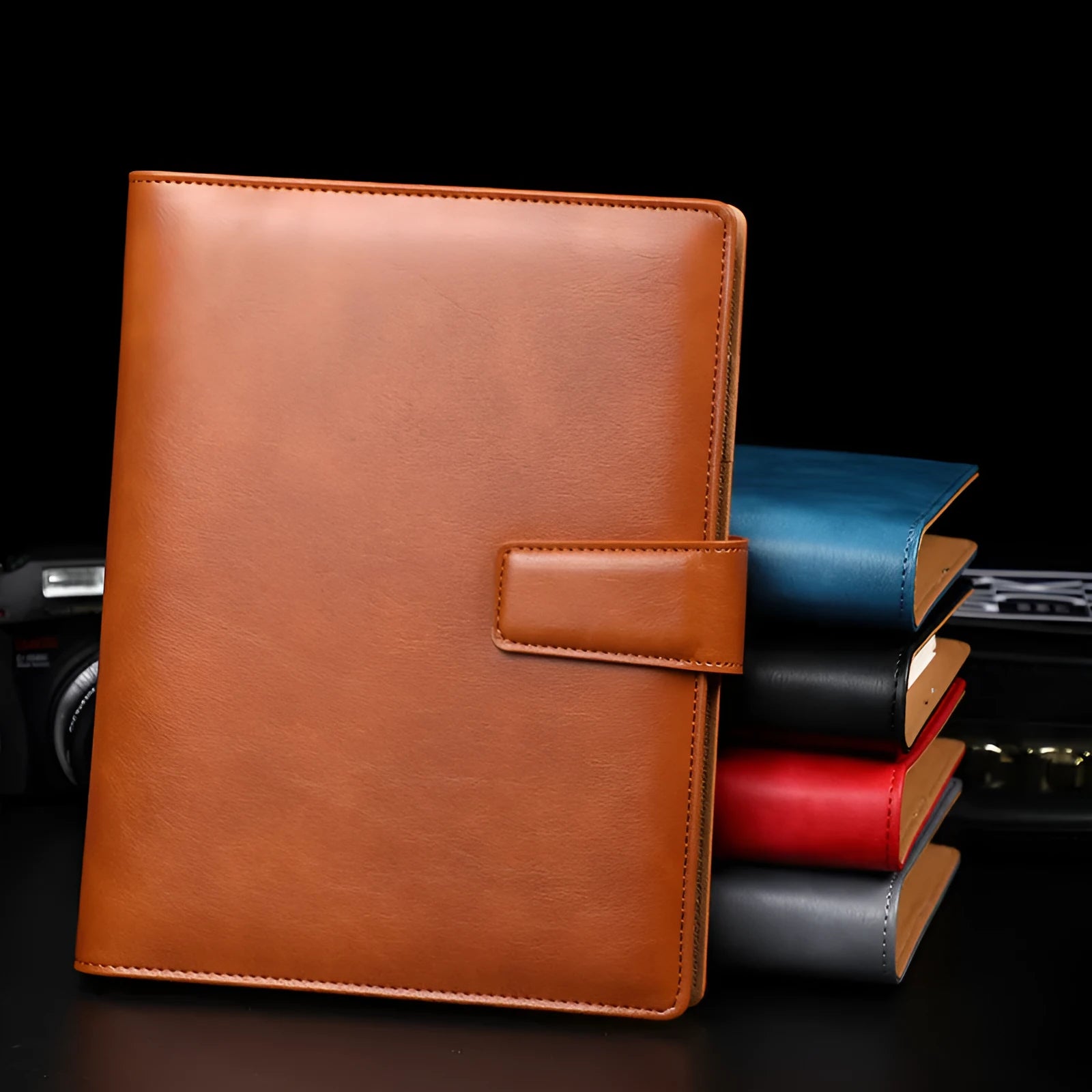 A5 leather notebook with buckle clip and 6-hole binding in multiple colours