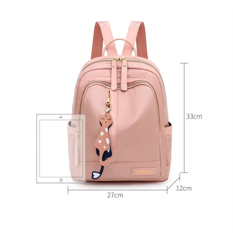 Black casual nylon backpack with double shoulder straps and external pocket.