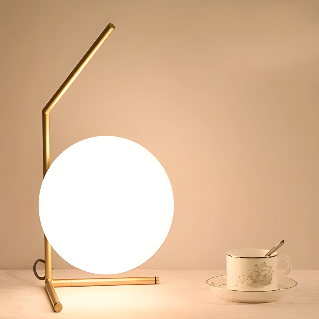 Glass shade LED desk lamp showing three size options and three-tone light colours on a desk.