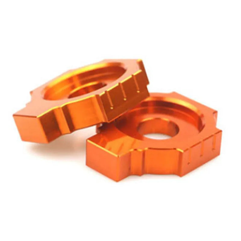 Orange anodised aluminium adjuster screws for KTM DUKE motorcycle rear forks