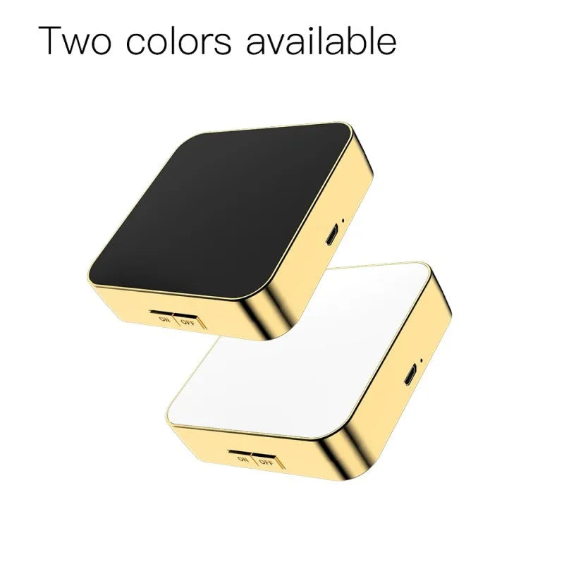 Black and white makeup mirror on table showing magnified and regular mirrors with illuminated ring light