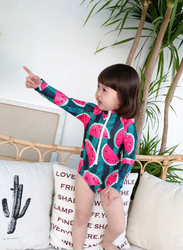 Cool watermelon children's long sleeve swimsuit set with fruit print on a white background