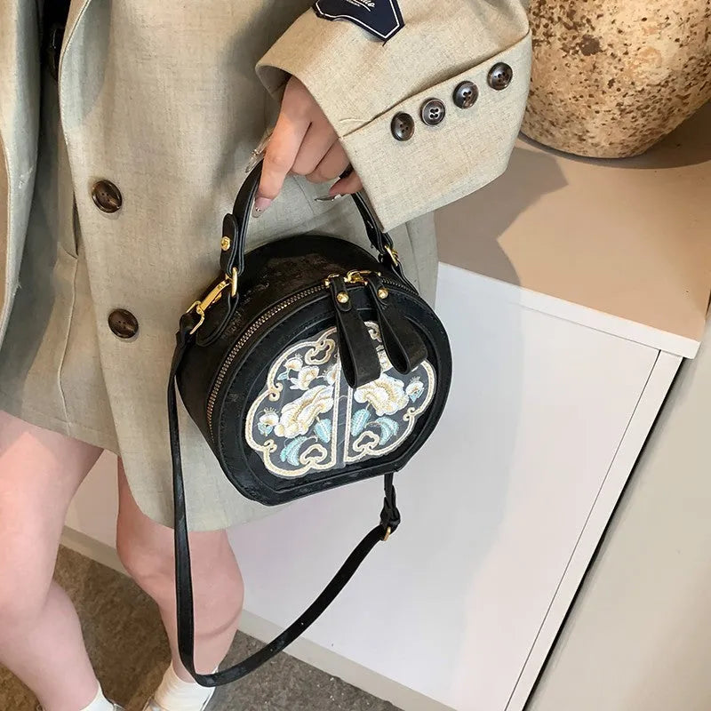 Chinese embroidery messenger bag in PU leather with square shape and adjustable shoulder strap