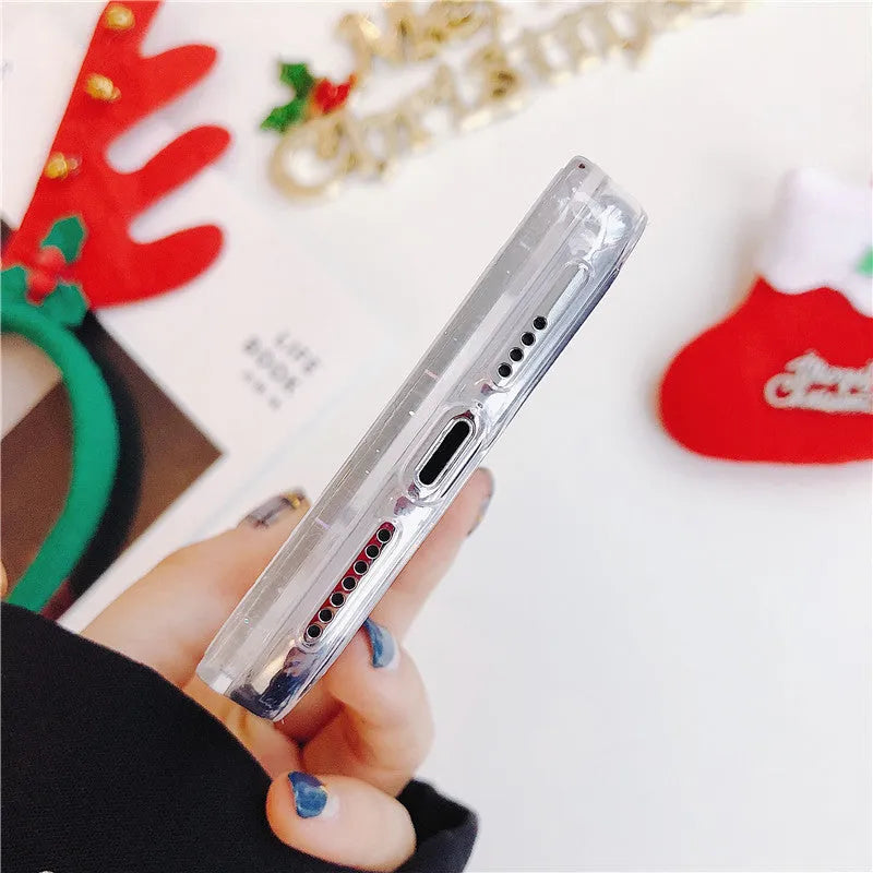 Christmas quicksand design phone case showing Santa Claus and tree patterns through transparent layers