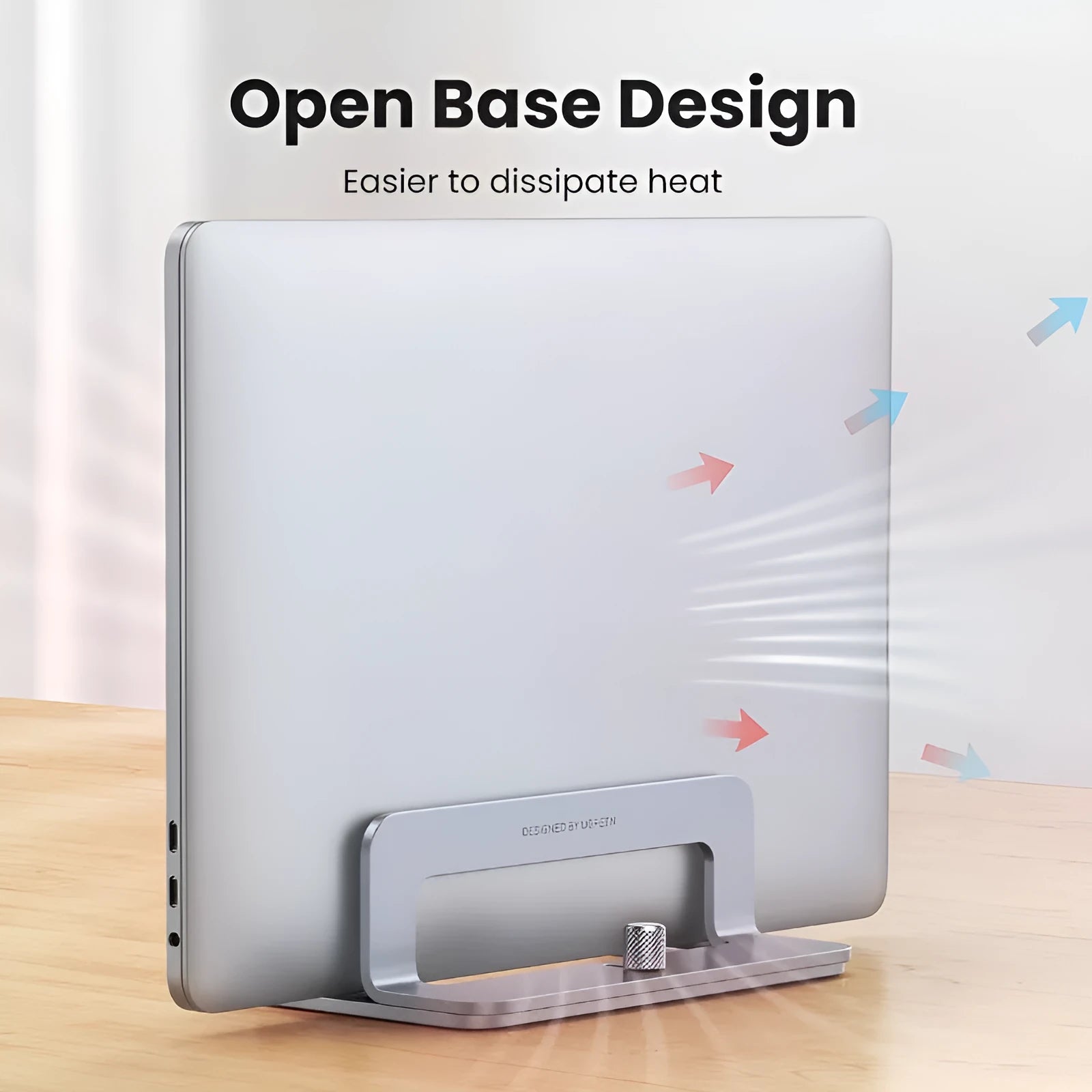 Silver aluminium alloy laptop cooling stand with adjustable width mechanism showing hollow design