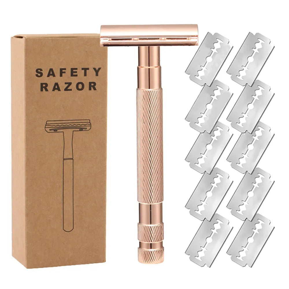 Old style manual double-sided safety razor with alloy handle and pack of 10 blades on a dark background.