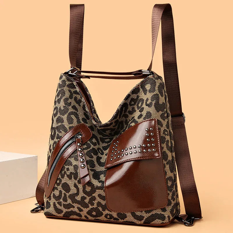Medium houndstooth nylon backpack for women with rivet design and zipper opening in Leopard Pattern