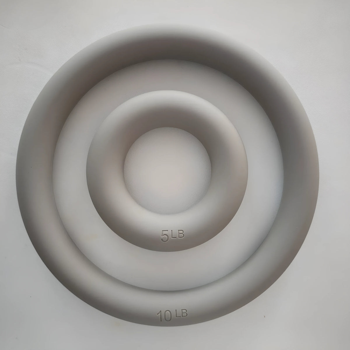 Glossy yoga weight ring in 5 lb or 10 lb silicone iron, available in black, pink, gray green, milk tea, flesh pink, and beige.