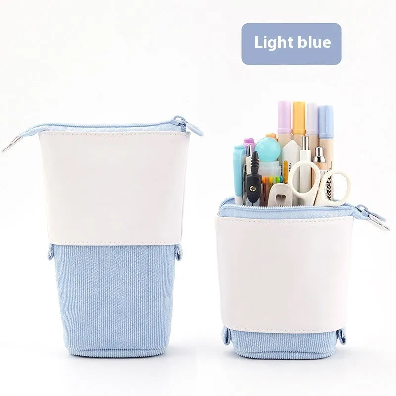 Soft PU corduroy telescopic pencil case in purple colour with drop-down open design.