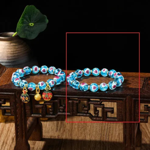 Handmade glass bracelet with swallowing gold beast design and heart shape in various colours