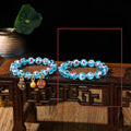 Handmade glass bracelet with swallowing gold beast design and heart shape in various colours