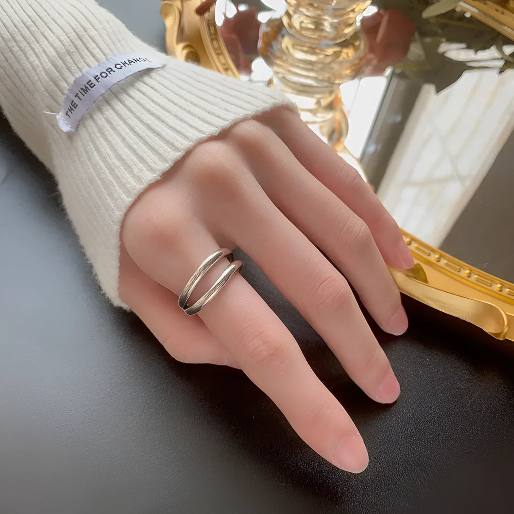 Women's retro copper double layer hollow geometry ring with adjustable opening.