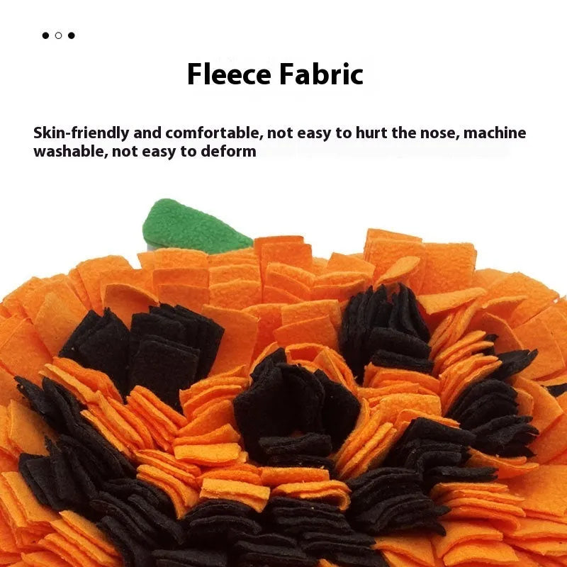 Orange pumpkin-shaped pet smell mat made of polar fleece for dog training and slow feeding.