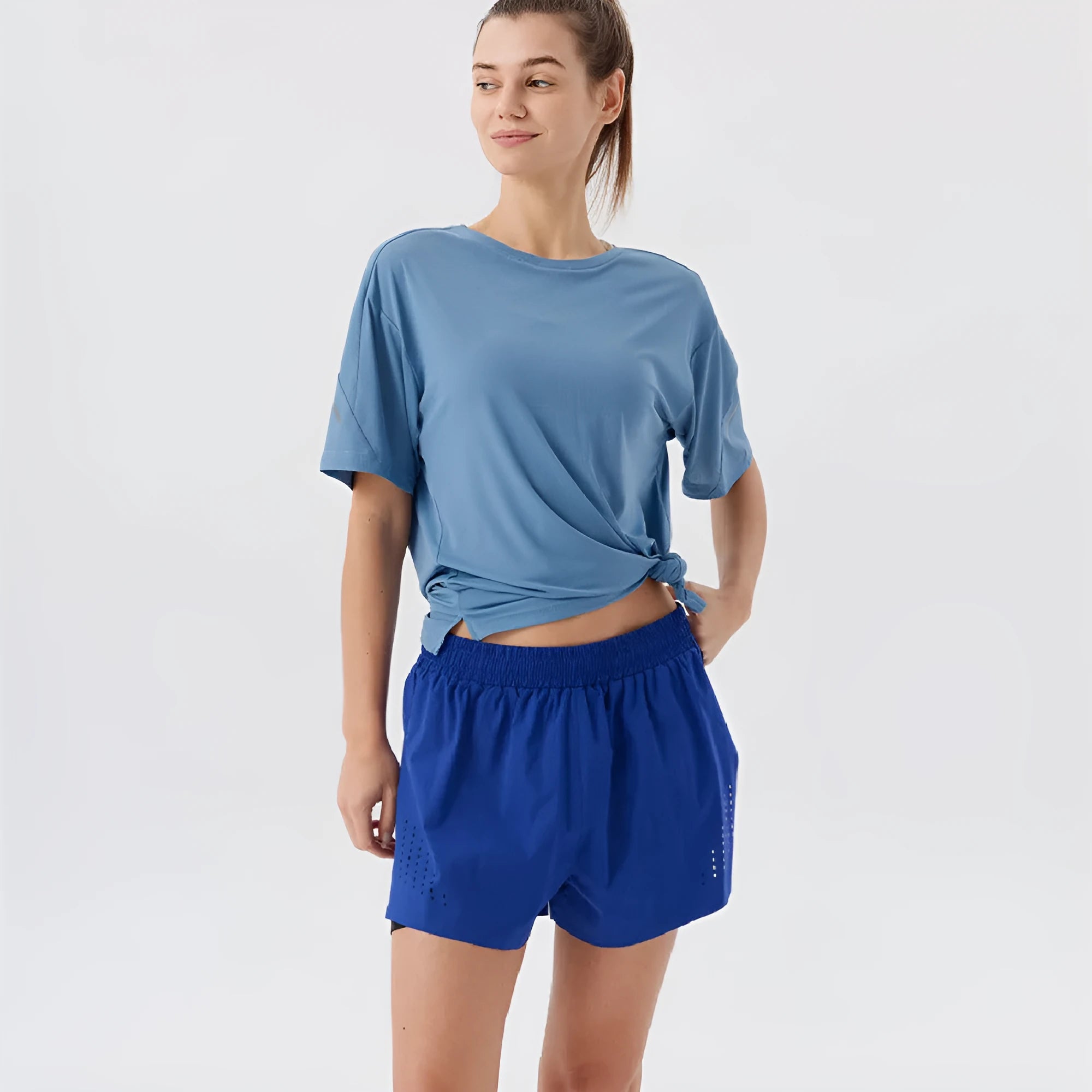 Men's straight-cut sports shorts with side slits in turmeric yellow colour